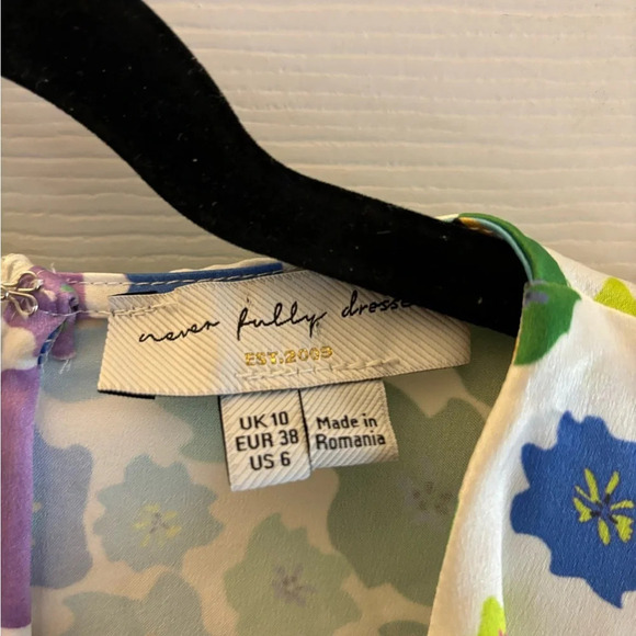 Never Fully Dressed
Flower Pebbles Mini Dress - Picture 5 of 5